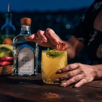 Bottle of Casa Mexico Blanco next to a Mango Margarita: Cinco! Drinko