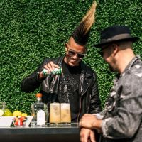Bartender pouring a Good Morning Cocktail to a patron